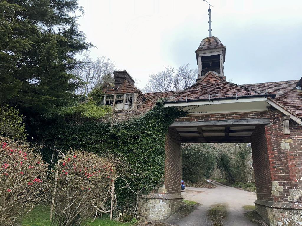 Lot: 57 - TWO-BEDROOM COTTAGE WITH ADJOINING CLOCK TOWER FOR REFURBISHMENT - Rear view of property